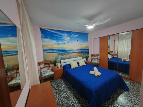 Ένα ή περισσότερα κρεβάτια σε δωμάτιο στο Vacances à la plage