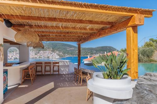 a house on the hill with a view at Evlalia Studios & Villas in Skopelos Town
