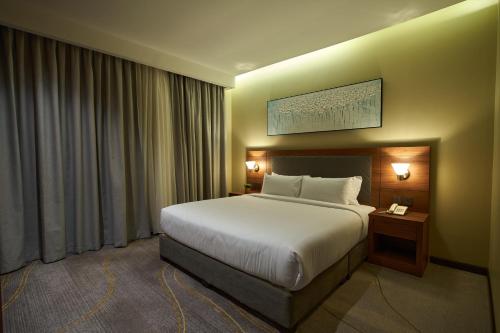 Platinum Hotelにあるベッド