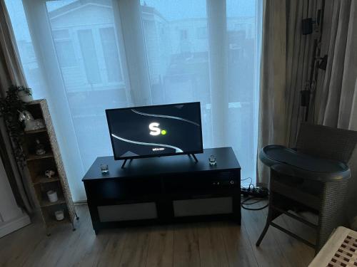 Caravane het zeepaardjeにあるテレビまたはエンターテインメントセンター