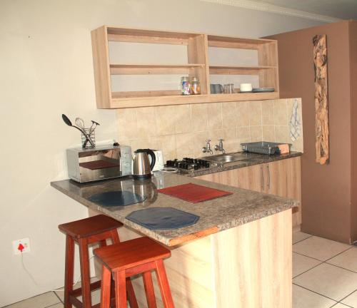 Dapur atau dapur kecil di Eagles Overnight