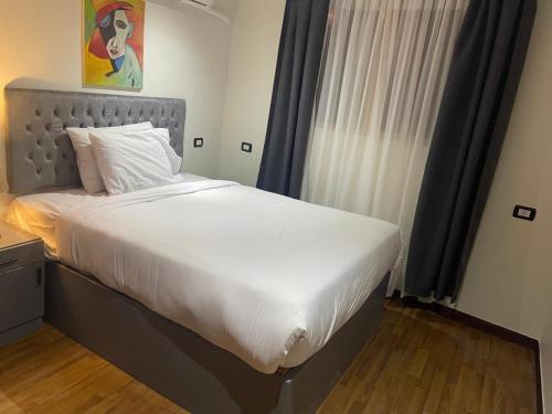 Postel nebo postele na pokoji v ubytování Modern 2 bedrooms apartment