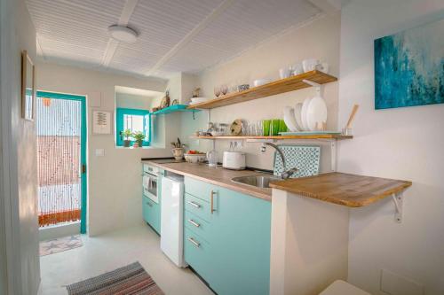 Η κουζίνα ή μικρή κουζίνα στο Casita en barrio de pescadores