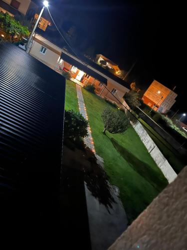 an aerial view of a yard at night at Viviendas uso turístico REME II in Foz