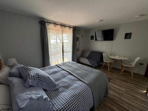 Ένα ή περισσότερα κρεβάτια σε δωμάτιο στο Frente al mar