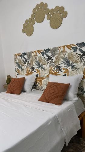 Postel nebo postele na pokoji v ubytování Chambre Djaou meublée Voidjou