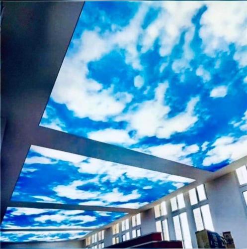 a view of a blue sky with white clouds at Vila Muntii Bucegi & SPA in Bran