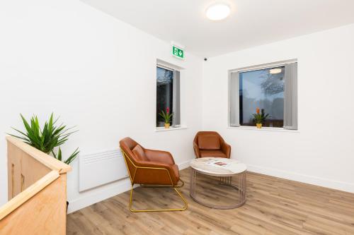 Χώρος καθιστικού στο The Suites Inn Hotel Birmingham Merry Hill