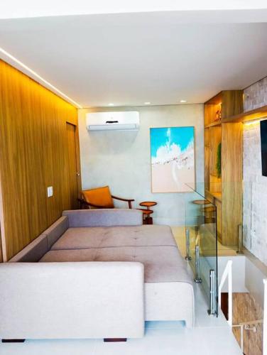 Cobertura duplex de frente para o marにあるベッド