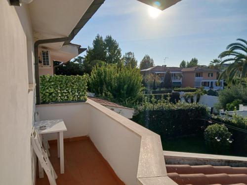 a balcony with a view of a yard at La casa di ale in Latina