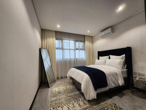 Giường trong phòng chung tại Opal Oasis