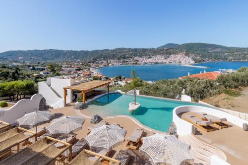 a view of the pool at a resort with a view at Evlalia Studios & Villas in Skopelos Town