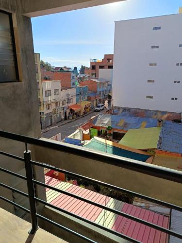 a view of a city from a balcony at Suma Qamaña in Copacabana