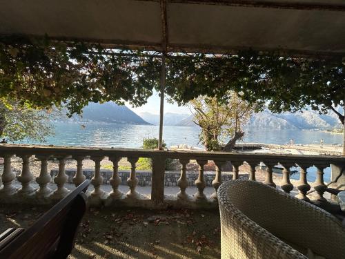 a view of a body of water from a balcony at Apartment Jovan2,on the beach with free Wi-Fi in Kotor