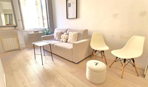 a living room with a couch and two chairs at Central Authentic Old Town by Prince Palace Place in Monte Carlo