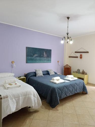 Ein Bett oder Betten in einem Zimmer der Unterkunft Ferula loft