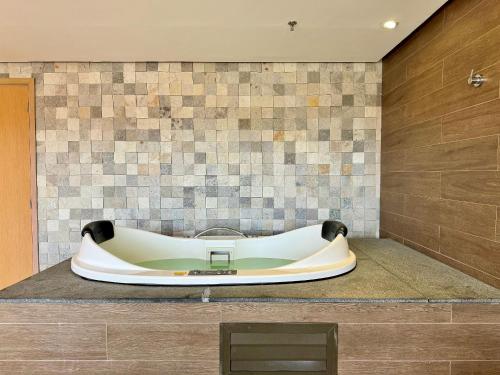 Koupelna v ubytování (1305) Studio moderno e aconchegante no Calhau