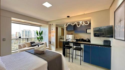 TV a/nebo společenská místnost v ubytování (1305) Studio moderno e aconchegante no Calhau