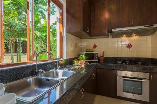 Dapur atau dapur kecil di Baan Tawan Chai