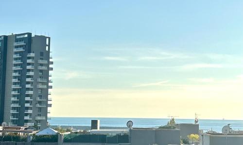 a view of the ocean from a building at Eva Suite Rooftop - Mini Appartmento in Mercatello