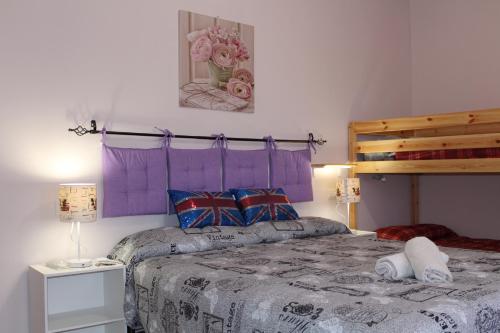 Кровать или кровати в номере Alghero 4u Self Check in