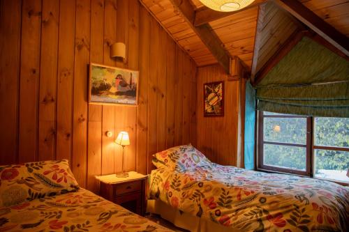 Postel nebo postele na pokoji v ubytování CasaVerde Hostal Ecologico
