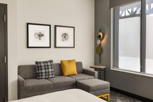 a living room with a couch and a window at TownePlace Suites by Marriott Memphis Germantown in Memphis