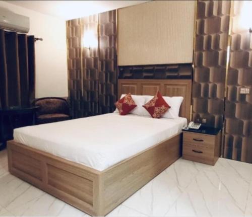 Hotel Sarawanにあるベッド