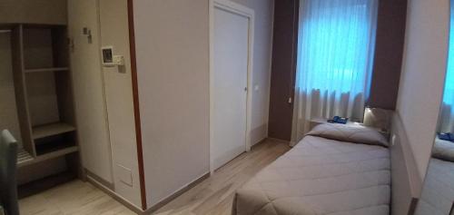 Кровать или кровати в номере Hotel Mistral