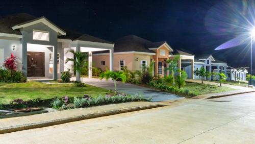 a row of houses in a subdivision at night at St Mary Peace Garden in St Mary