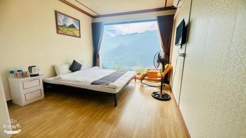 Μια τηλεόραση ή/και κέντρο ψυχαγωγίας στο Homestay Thạch Gia Trang Sapa