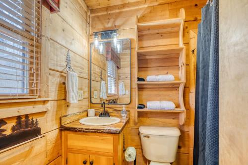 a bathroom with a toilet and a sink at Secluded Sunrise Ridge-10 Min From Blue Ridge, King Beds, Hot Tub, 2 Porches, Fireplace Wood Burning, Mountain View, Cozy in Blue Ridge