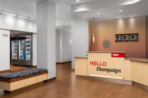 a hello pharmacy counter in a hospital lobby at TownePlace Suites by Marriott Champaign in Champaign