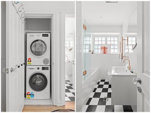 a bathroom with a washing machine and a sink at Superb 2-Bed Apartment Facing Rose Bay Marina in Sydney
