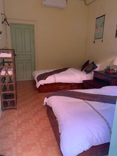 Ein Bett oder Betten in einem Zimmer der Unterkunft Phong lack Guest House