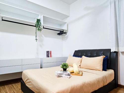 Ένα ή περισσότερα κρεβάτια σε δωμάτιο στο Beacon Executive Suite by NGN - Georgetown Penang