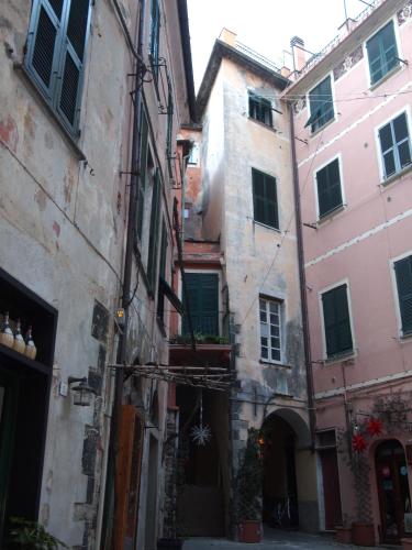 an alley in an old town with buildings at Zia Letizia Bed And Wine in Monterosso al Mare