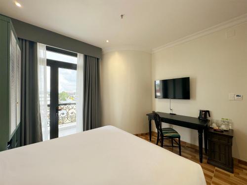 TV a/nebo společenská místnost v ubytování Jay Grand Dalat Hotel