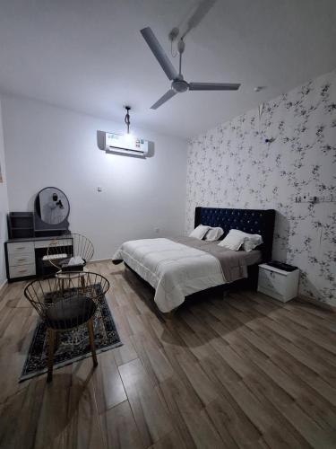 Postel nebo postele na pokoji v ubytování Al Falak Chalet