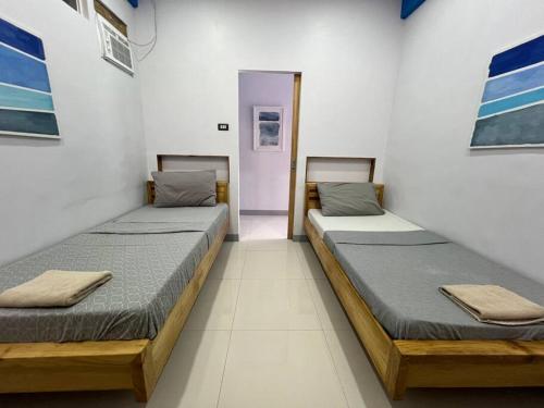 Katil atau katil-katil dalam bilik di Kidapawan Staycation 4