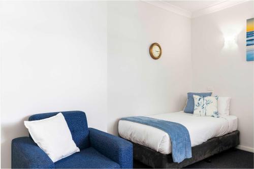 Ένα ή περισσότερα κρεβάτια σε δωμάτιο στο Bayside Retreat Glenelg