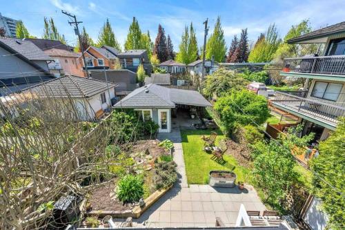 an aerial view of a house with a yard at Charming East Van Home Near DT and Commercial St in Vancouver