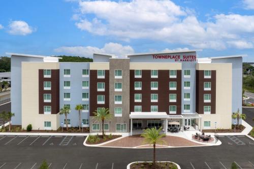 a rendering of a hotel with a parking lot at TownePlace Suites Jacksonville Airport in Jacksonville