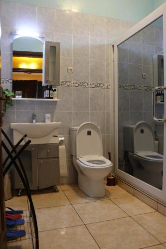 Koupelna v ubytování Umusambi B&B
