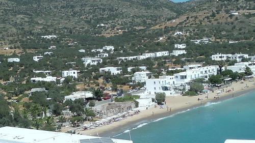an aerial view of a beach with white buildings at Giannakas Studios in Platis Yialos Sifnos