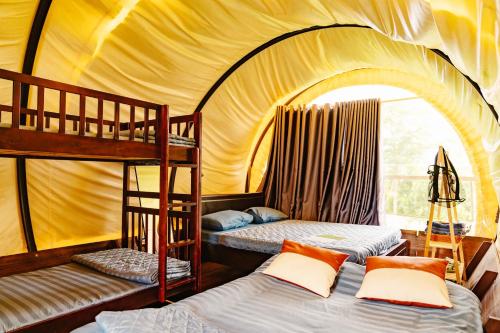 Postel nebo postele na pokoji v ubytování Panorama Glamping