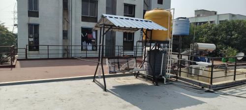 a playground in front of a building at Neelam Gardens in Nashik