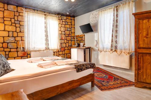 Una cama o camas en una habitación de Moonlight of Cappadocia