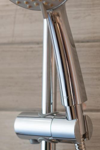 a close up of a chrome chair with a table at Wuyu Hotel - Chongqing Liangjiang Happiness Plaza & Xingfu Square & GuangdianYuan metro in Chongqing