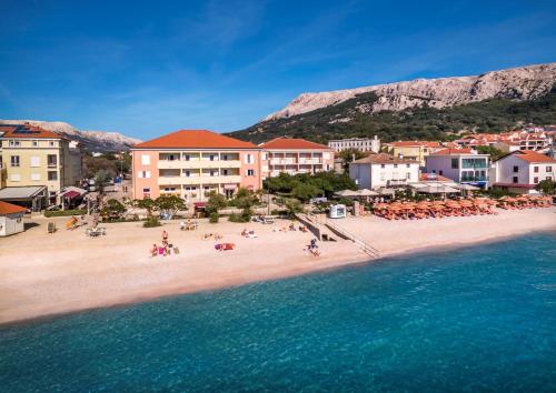 an aerial view of a beach in a resort at Valamar Villa Adria in Baška